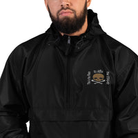 Affix the STAMP Embroidered Champion Packable Jacket